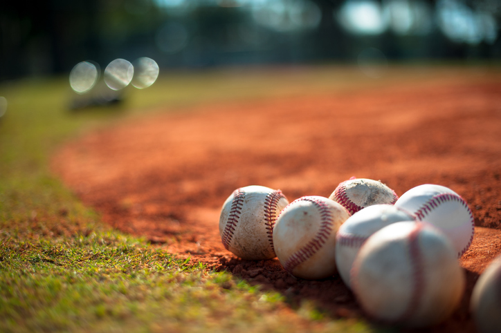 Little League Baseballs on Pitching Mound Close Up